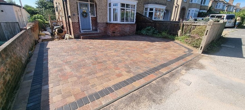 Job completed on time and a very happy customer. We used Tobermore block paving. Tegula trio in Heather with a charcoal border.